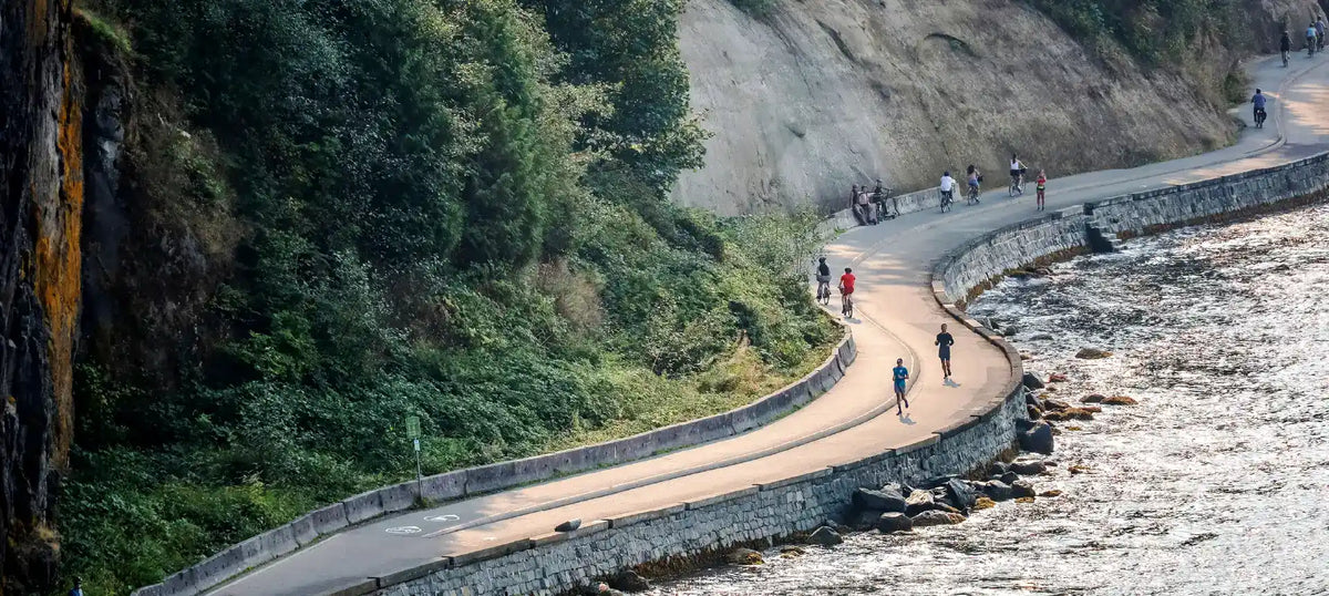 People running and walking along the Vancouver Seawall