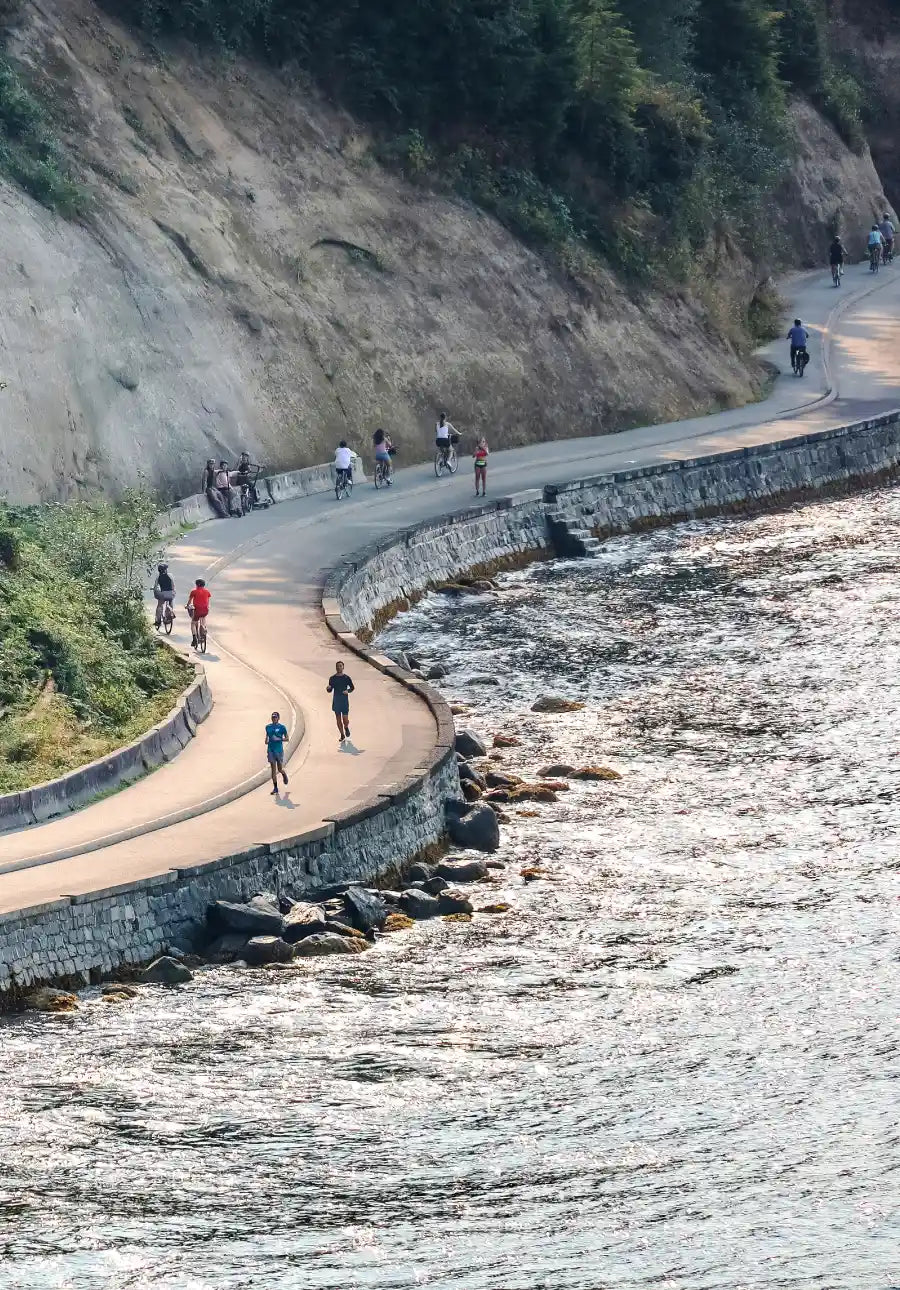 People running and walking along the Vancouver Seawall