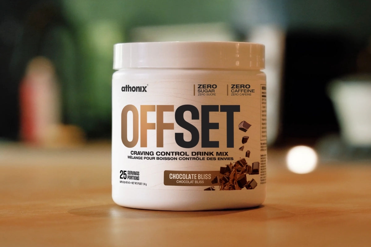 A bottle of Athonix OFFSET Chocolate Bliss from the product video sitting on a kitchen counter